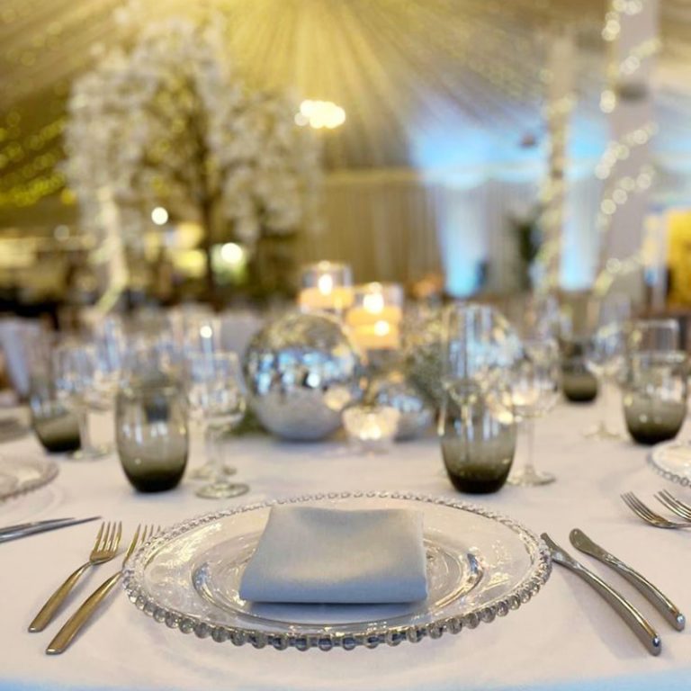 Silver and grey winter wedding table setting at Selden Barns
